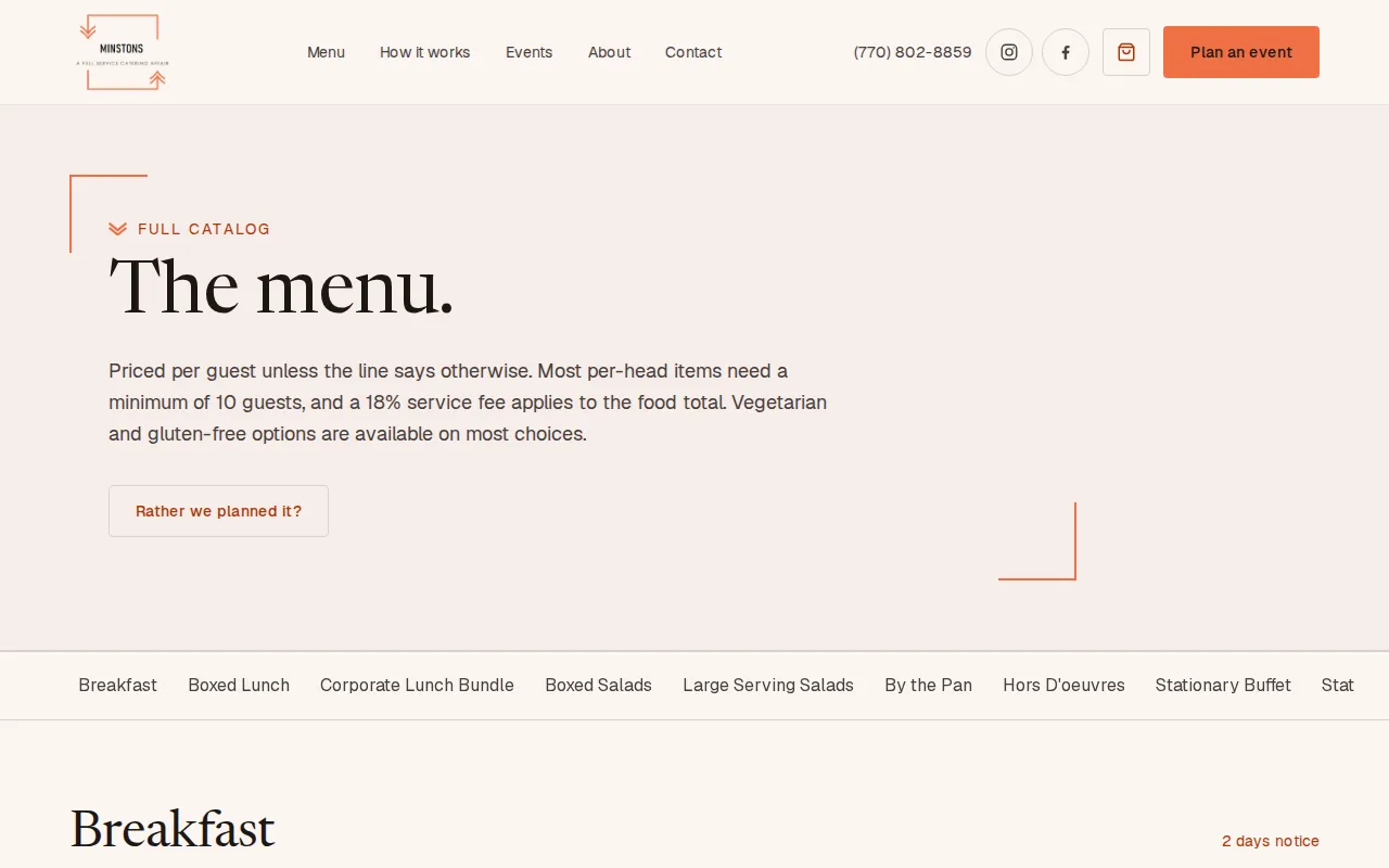 Online ordering on the new catering website: heading The menu, a note that prices are per guest with a 10-guest minimum on most items and an 18% service fee, and tabs for Breakfast, Boxed Lunch, Corporate Lunch Bundle, Boxed Salads, Hors D'oeuvres and more
