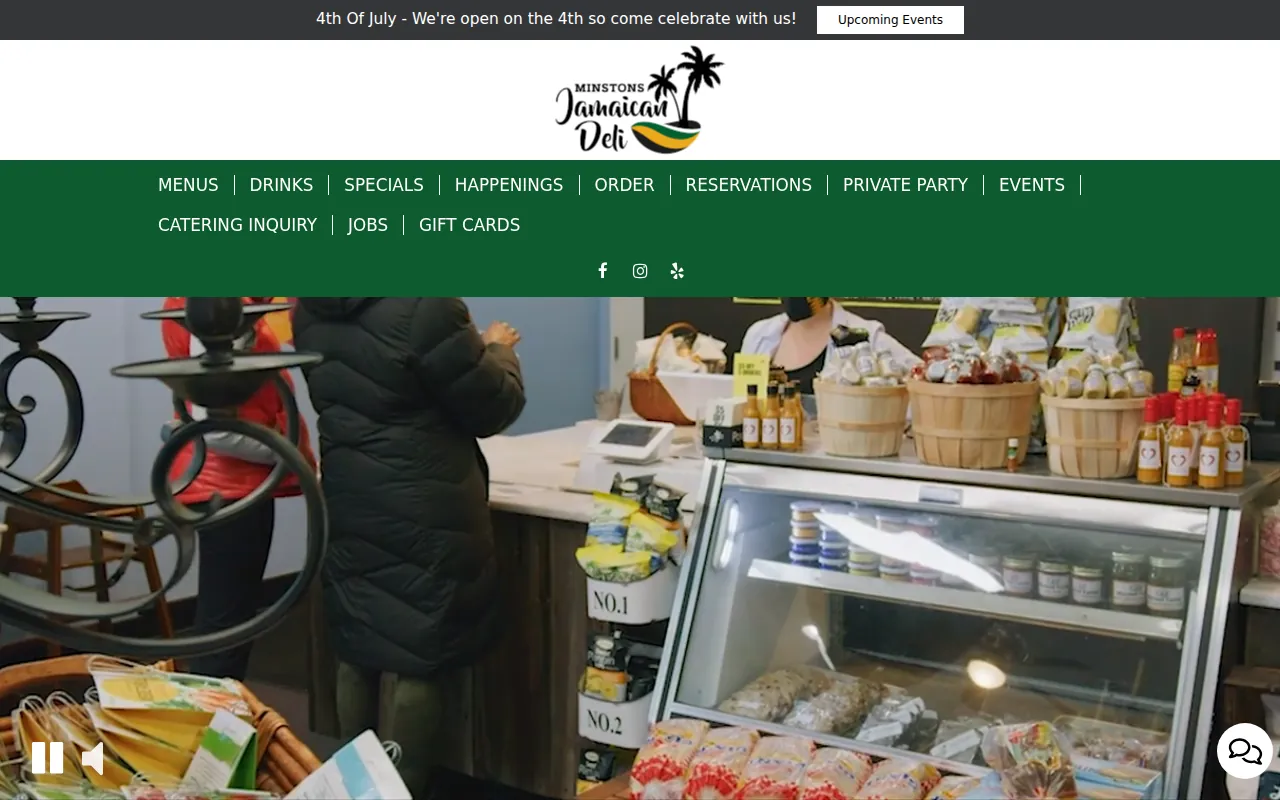 Minston's Jamaican Deli on its old SpotHopper website: announcement bar, centered logo, green bar of uppercase menu links split by lines, full-width video with pause and mute buttons, and a chat bubble